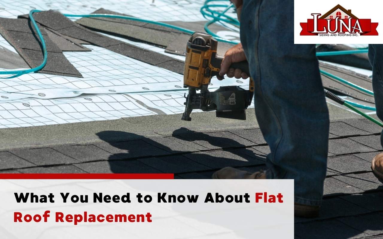 A professional team performing a flat roof replacement on a commercial building.