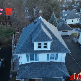 Licensed and insured roofing professionals on a job site.