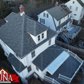 Licensed and insured roofing professionals on a job site.